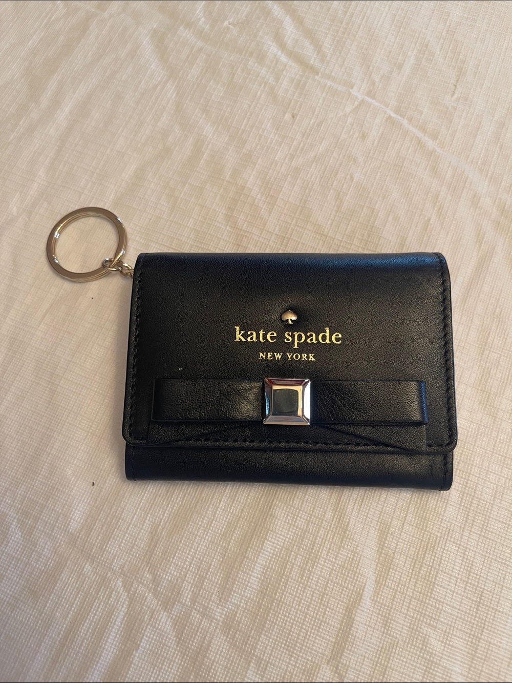 kate spade black leather bow key & card holder with gold logo NWOT